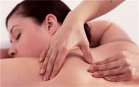 Hand applying thia deep tissue massage to back and shoulder